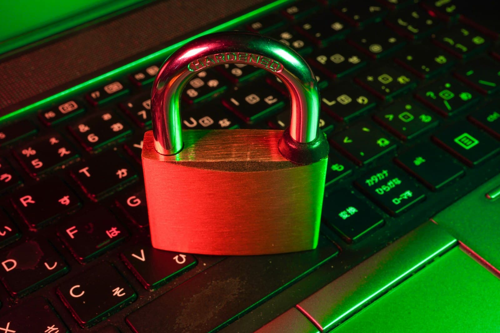 Laptop keyboard with a digital padlock overlay representing cybersecurity training